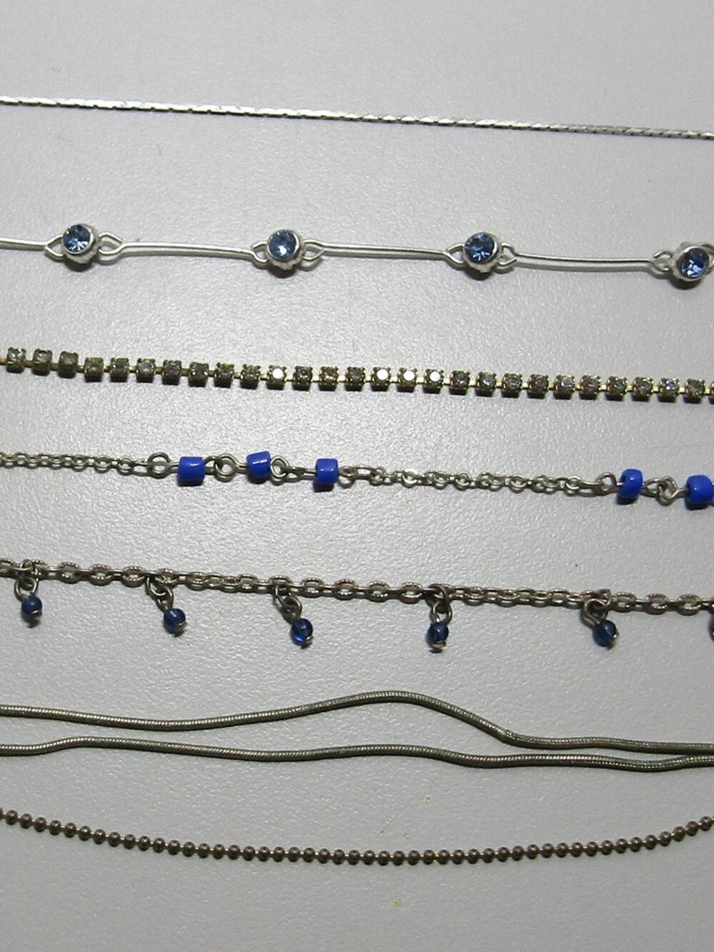 Lot of 6 vintage silver tone chain style bracelets 3 have blue beads